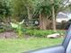 Signage for Chestnut Lake and Downs Mill Lake with well-maintained landscaping at 4678 Browns Mill Ferry Rd, Lithonia, GA 30038