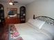 Spacious bedroom featuring a bed, dresser, and ample storage at 4678 Browns Mill Ferry Rd, Lithonia, GA 30038