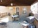 Back patio featuring a dining table and grill at 4678 Browns Mill Ferry Rd, Lithonia, GA 30038