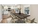 Virtually staged dining area adjacent to the kitchen, perfect for entertaining guests at 2283 Noahs Ark Rd, Jonesboro, GA 30236