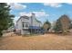 Backyard view with deck, landscaping, and access to the home's exterior at 4740 Arbor Meadows Dr, Cumming, GA 30040