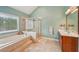 Bathroom featuring a soaking tub, shower and vanity with double sinks at 4740 Arbor Meadows Dr, Cumming, GA 30040