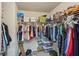 Walk-in closet with lots of storage and shelving at 4740 Arbor Meadows Dr, Cumming, GA 30040
