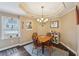 Cozy dining area with a square table, natural light, and casual decor, perfect for everyday meals at 4740 Arbor Meadows Dr, Cumming, GA 30040