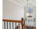 Spacious foyer with a staircase, chandelier, and double doors, providing a grand entrance to the home at 4740 Arbor Meadows Dr, Cumming, GA 30040