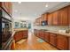 Spacious kitchen with granite countertops, stainless appliances, and an adjoining dining area at 4740 Arbor Meadows Dr, Cumming, GA 30040