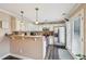 Bright kitchen with stainless steel appliances, granite countertops, and easy access to outdoor patio at 4740 Arbor Meadows Dr, Cumming, GA 30040