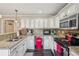 Efficient kitchen with granite counter tops, stainless steel appliances, and plenty of cabinet space at 4740 Arbor Meadows Dr, Cumming, GA 30040
