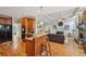 Open-concept kitchen and living space with a breakfast bar and a cozy atmosphere at 4740 Arbor Meadows Dr, Cumming, GA 30040