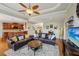 Open living room with hardwood floors and easy access to the kitchen at 4740 Arbor Meadows Dr, Cumming, GA 30040