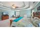 Spacious primary bedroom suite with a tray ceiling, ceiling fan, and generous natural light at 4740 Arbor Meadows Dr, Cumming, GA 30040