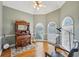 Elegant music room with vintage organ, hardwood floors, and natural light at 4740 Arbor Meadows Dr, Cumming, GA 30040
