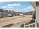 Scenic neighborhood view from the porch, showcasing well-maintained lawns, mature trees, and peaceful residential streets at 4740 Arbor Meadows Dr, Cumming, GA 30040