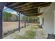 Covered patio area and a view of the backyard and landscaping at 4740 Arbor Meadows Dr, Cumming, GA 30040