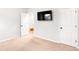 Bedroom with carpeted floor, television, and doorways at 4758 Sultana Way, Atlanta, GA 30331