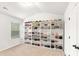 Walk-in closet with rows of shelving and a window at 4758 Sultana Way, Atlanta, GA 30331