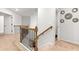 Upstairs hallway with decorative mirrors, wooden handrail, and carpeted floors at 4758 Sultana Way, Atlanta, GA 30331