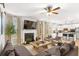 Spacious living room with a fireplace and comfortable seating arrangement at 4758 Sultana Way, Atlanta, GA 30331