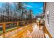 Spacious wooden deck with metal railing, perfect for outdoor living at 218 Pine Needle Trl, Villa Rica, GA 30180