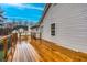 Wood deck with metal railing, perfect for relaxation or entertaining at 218 Pine Needle Trl, Villa Rica, GA 30180