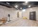 Finished basement space featuring unique ceiling design and vinyl flooring at 218 Pine Needle Trl, Villa Rica, GA 30180