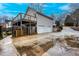 This home includes an attached three car garage, long driveway, and second story deck at 218 Pine Needle Trl, Villa Rica, GA 30180