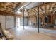Spacious unfinished garage featuring multiple garage doors and exposed ceiling at 218 Pine Needle Trl, Villa Rica, GA 30180