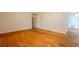 Hardwood flooring and neutral paint throughout this versatile open living space at 218 Pine Needle Trl, Villa Rica, GA 30180