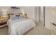 Bright bedroom featuring a queen-sized bed and neutral decor at 2201 Cormac St, East Point, GA 30344