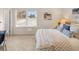 Bright bedroom featuring a queen-sized bed and neutral decor at 2201 Cormac St, East Point, GA 30344