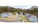 Charming new construction homes in a cul-de-sac with well-manicured lawns and sidewalks at 2201 Cormac St, East Point, GA 30344