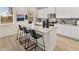 Modern kitchen featuring a large island, stainless steel appliances, and sleek cabinetry at 2201 Cormac St, East Point, GA 30344