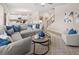 Cozy living room featuring a comfortable gray sectional sofa and a decorative rug at 2201 Cormac St, East Point, GA 30344