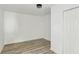 Bedroom featuring light wood floors, overhead lighting and a closet with double doors at 4340 Boxwood Trl, Ellenwood, GA 30294