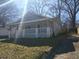 Charming single-story home with a welcoming front porch and classic architectural details at 550 Lake Dr, Hapeville, GA 30354