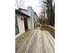 Wooden deck with railing offering exterior access at 1173 Mill Ridge Dr, Lawrenceville, GA 30045
