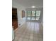 Dining area with tile floors and windows with views to the deck at 1173 Mill Ridge Dr, Lawrenceville, GA 30045