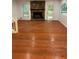 Living room featuring a stone fireplace and hardwood floors at 1173 Mill Ridge Dr, Lawrenceville, GA 30045
