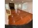Spacious living room with hardwood floors, fireplace, and large windows at 1173 Mill Ridge Dr, Lawrenceville, GA 30045