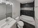 Modern bathroom with a tub and decorative tiles at 2548 Loghaven Nw Dr, Atlanta, GA 30318