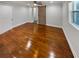 Bedroom with hardwood floors and a barn door at 2548 Loghaven Nw Dr, Atlanta, GA 30318