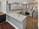 Modern kitchen featuring stainless steel appliances and quartz countertops at 2548 Loghaven Nw Dr, Atlanta, GA 30318