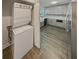 Convenient laundry area with a washer/dryer and kitchen view at 2548 Loghaven Nw Dr, Atlanta, GA 30318