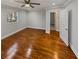 Spacious main bedroom featuring beautiful hardwood floors at 2548 Loghaven Nw Dr, Atlanta, GA 30318