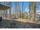 View of the backyard, with a shed at 613 Woodstone Rd, Lithonia, GA 30058