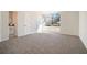 A bedroom features a large window and closet; ensuite bathroom with a granite countertop at 613 Woodstone Rd, Lithonia, GA 30058