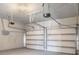 Spacious two car garage with automatic door openers and painted walls at 613 Woodstone Rd, Lithonia, GA 30058