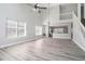 Spacious open-concept living room features soaring ceilings and tons of natural light at 613 Woodstone Rd, Lithonia, GA 30058