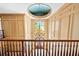 Grand foyer with a domed ceiling, chandelier, and staircase showcasing elegant architectural details at 8480 St Marlo Fairway, Duluth, GA 30097