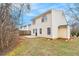 Home's backyard featuring a patio, grass, and fencing at 132 Prity Ct, Mcdonough, GA 30253